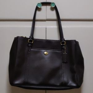 Coach dark maroon burgundy-ish color with gold